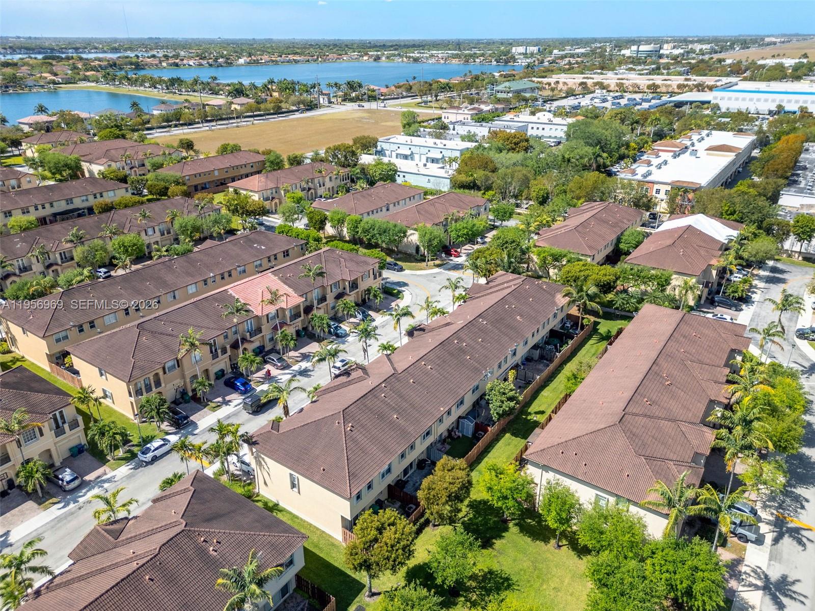 12965 Southwest 133rd Terrace Miami, FL 33186 - Photo 38 of 42 an aerial view of a city with lots of residential buildings