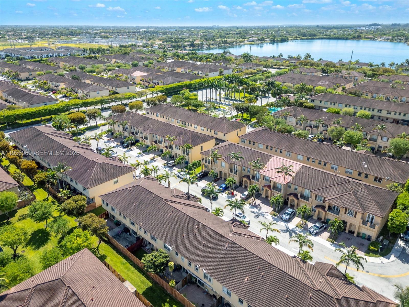 12965 Southwest 133rd Terrace Miami, FL 33186 - Photo 40 of 42 an aerial view of a city with lots of residential buildings
