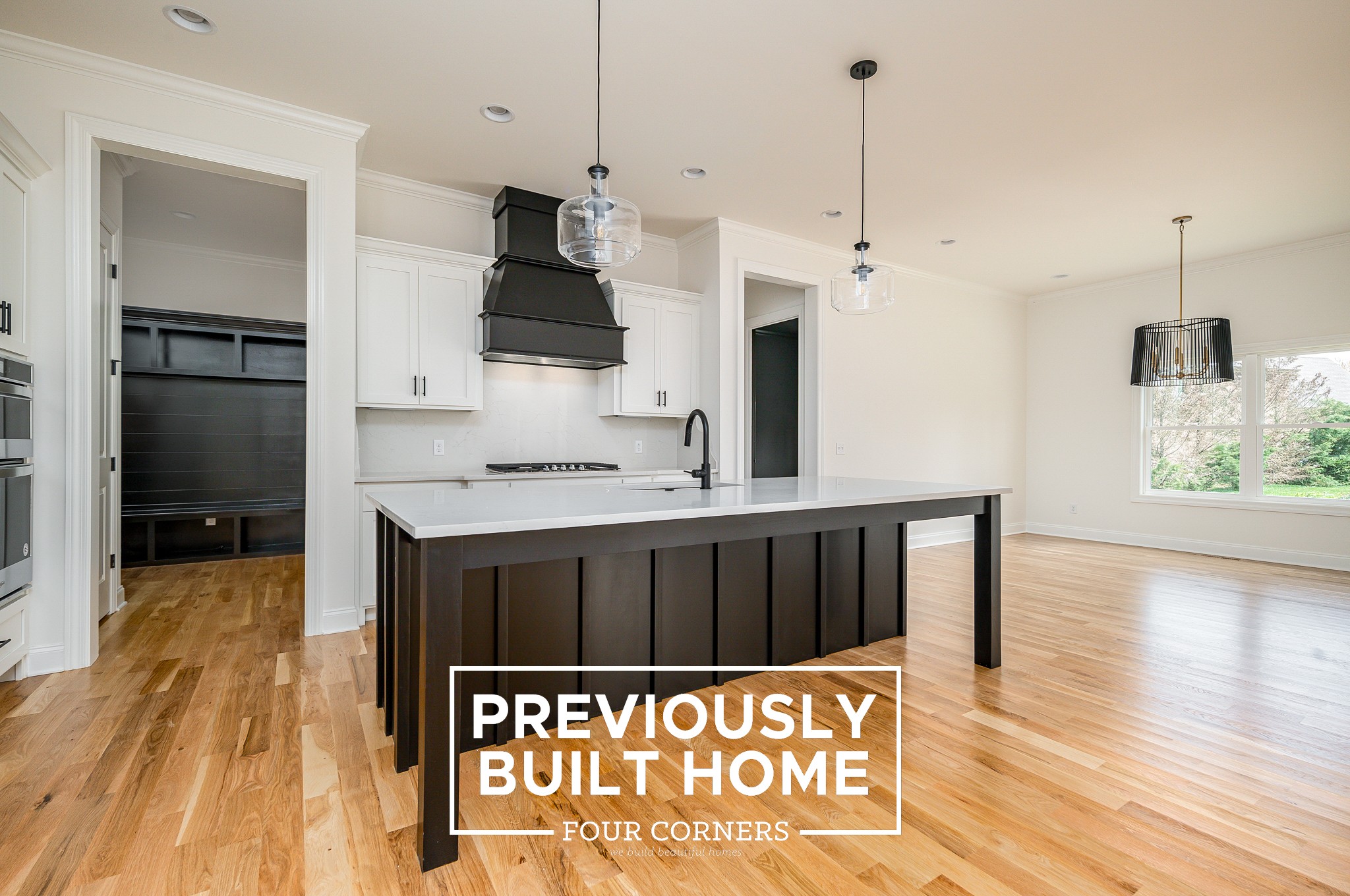 5422 Maroon Drive Murfreesboro, TN 37129 - Photo 11 of 35 a kitchen with stainless steel appliances kitchen island granite countertop a stove a sink and a wooden floor