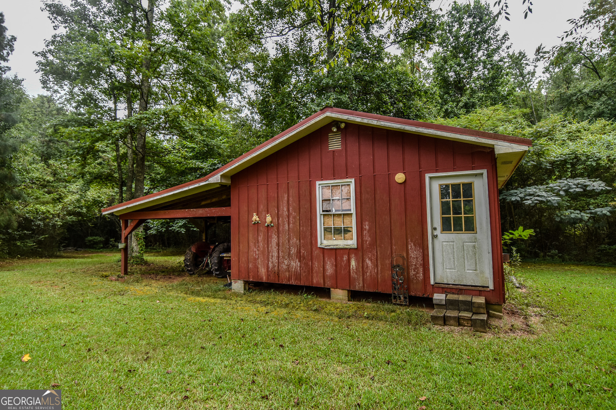 223 Ward Road Williamson, GA 30292 - Photo 14 of 51 a view of backyard of house with green space