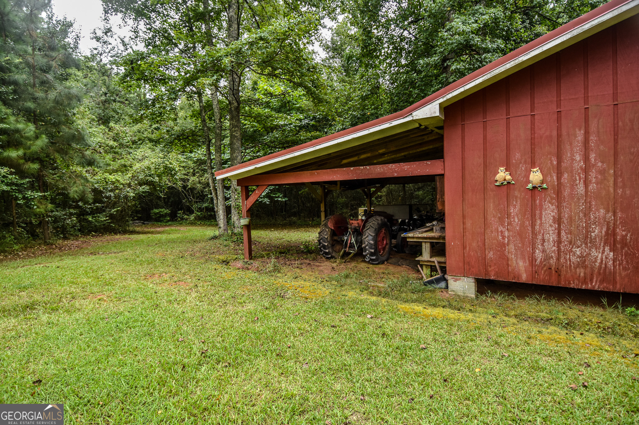 223 Ward Road Williamson, GA 30292 - Photo 15 of 51 a view of backyard with deck and backyard