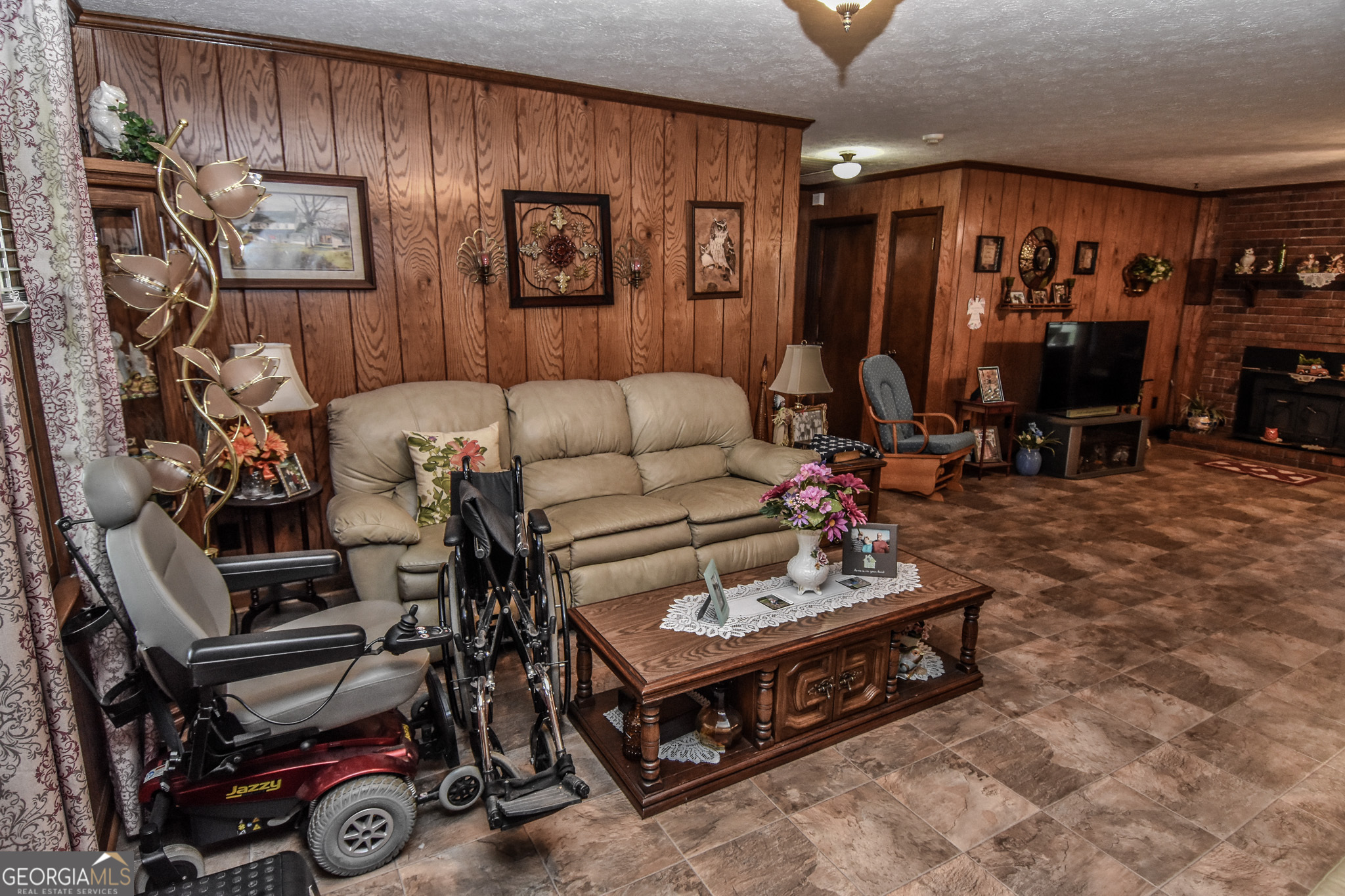 223 Ward Road Williamson, GA 30292 - Photo 23 of 51 a living room with furniture a air conditioner and a table