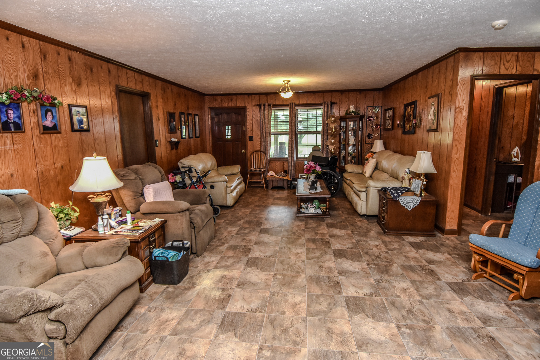 223 Ward Road Williamson, GA 30292 - Photo 28 of 51 a living room with furniture a window and gym equipment