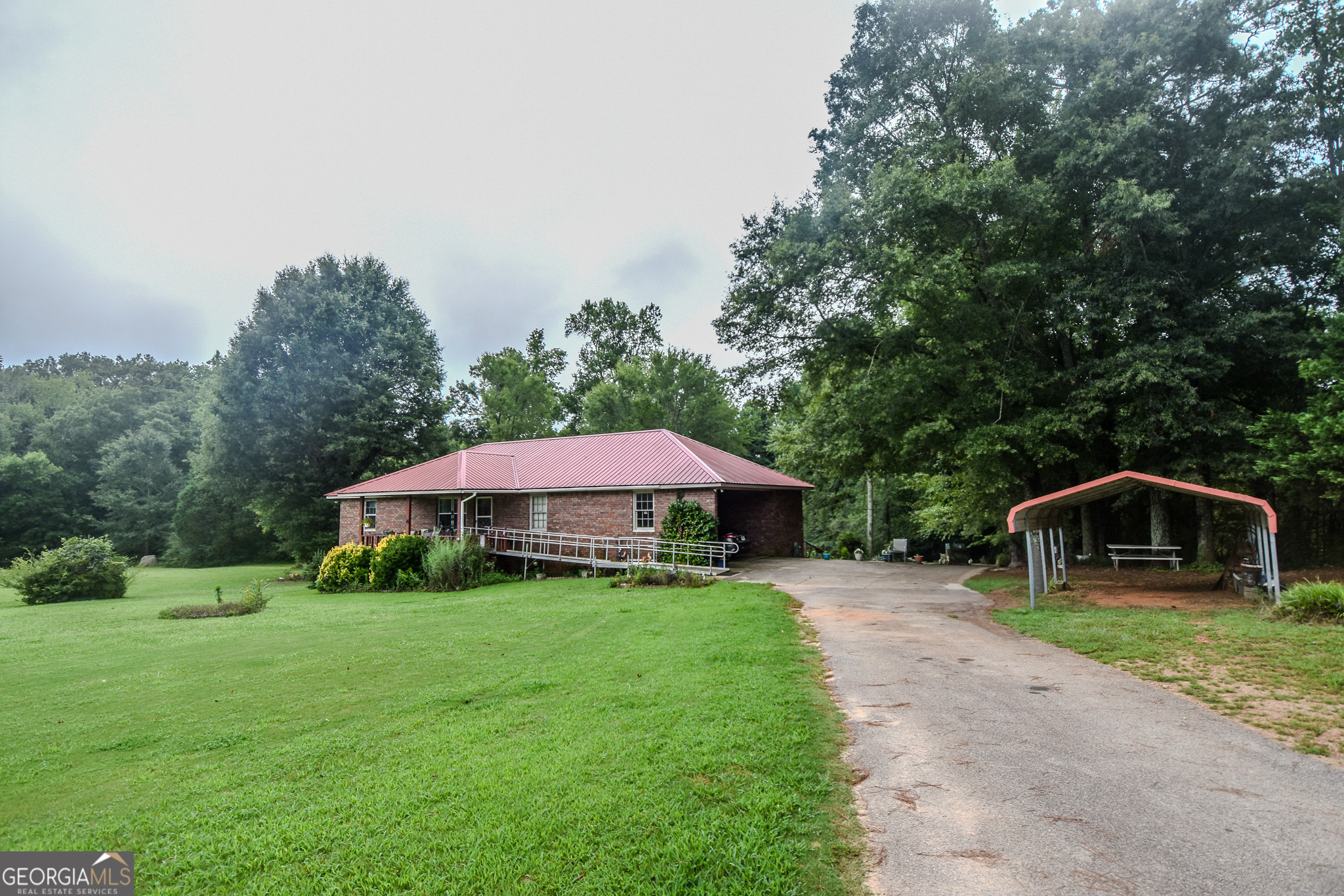 223 Ward Road Williamson, GA 30292 - Photo 3 of 51 a view of a house with a yard