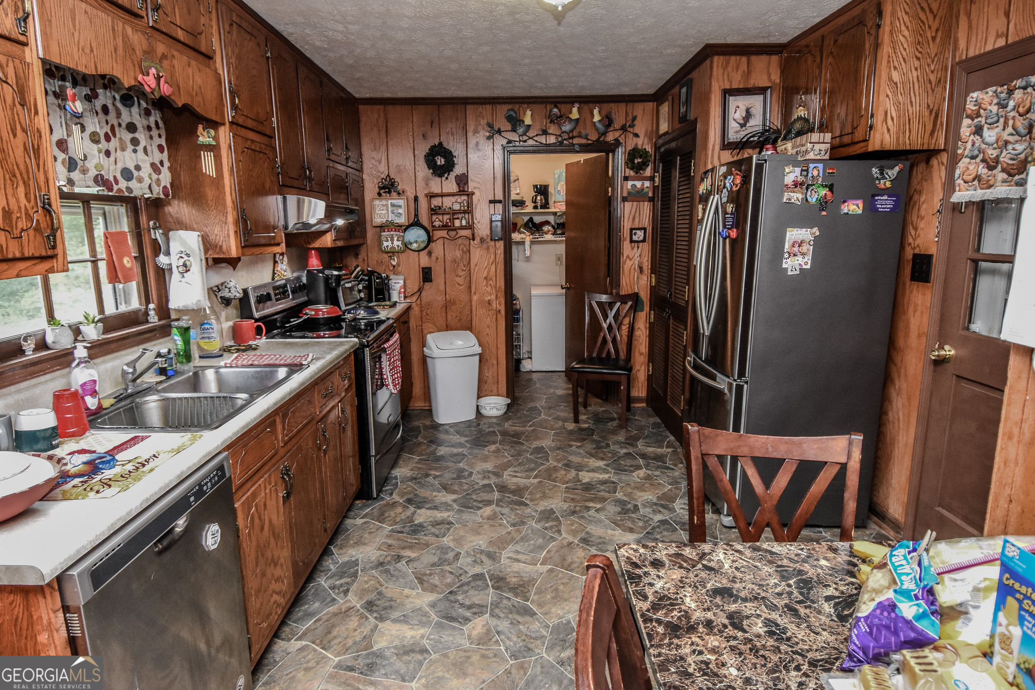 223 Ward Road Williamson, GA 30292 - Photo 39 of 51 a kitchen with lots of counter top space and appliances