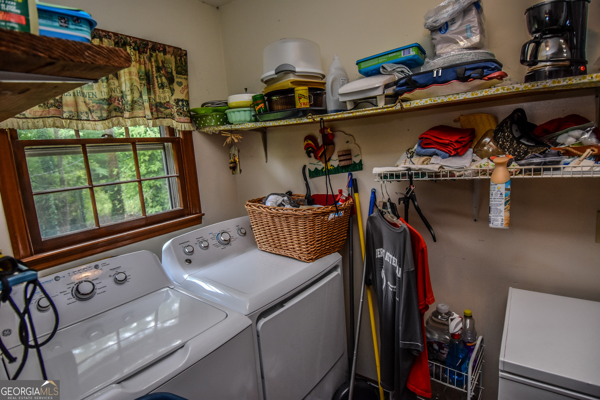 223 Ward Road Williamson, GA 30292 - Photo 40 of 51 a utility room with dryer washer and other items