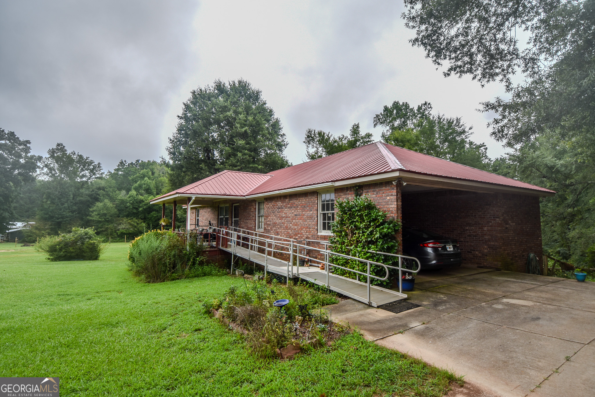 223 Ward Road Williamson, GA 30292 - Photo 4 of 51 a view of a barn with a yard
