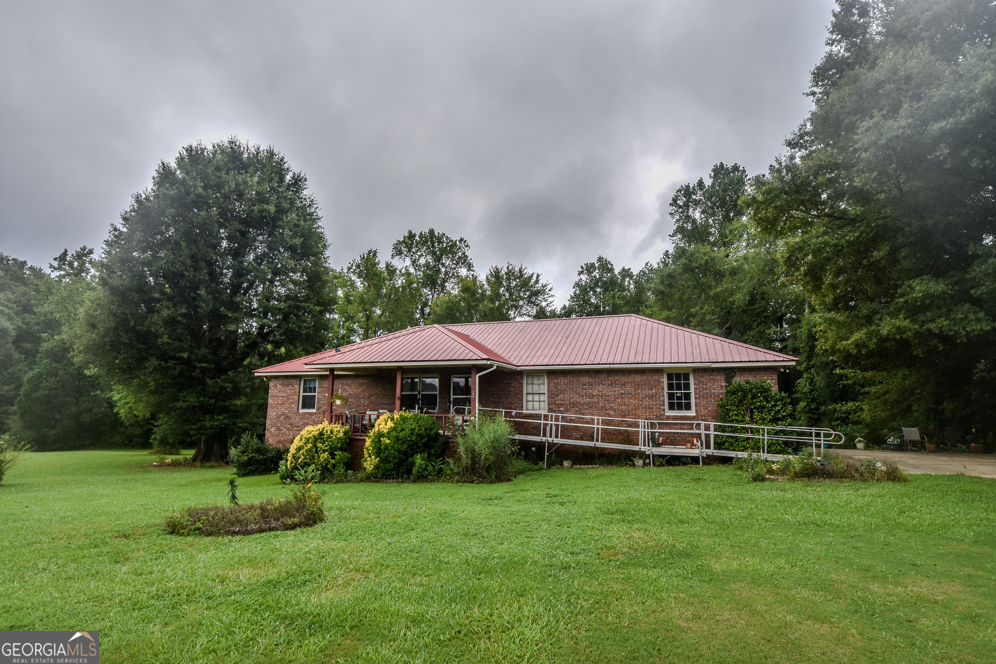 223 Ward Road Williamson, GA 30292 - Photo 6 of 51 a view of a house with a yard and sitting area