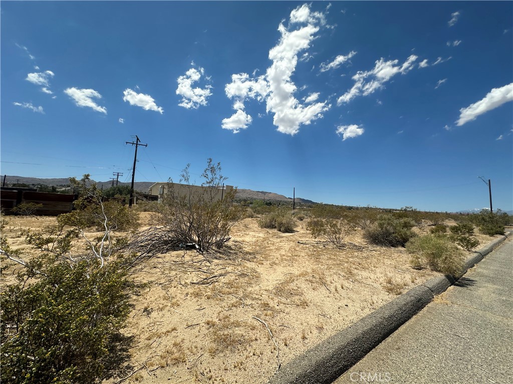0 Sunset Road Joshua Tree, CA 92252 - Photo 4 of 10 a view of a swimming pool with a yard