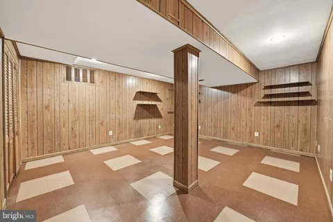 a bathroom with a sink toilet and a mirror