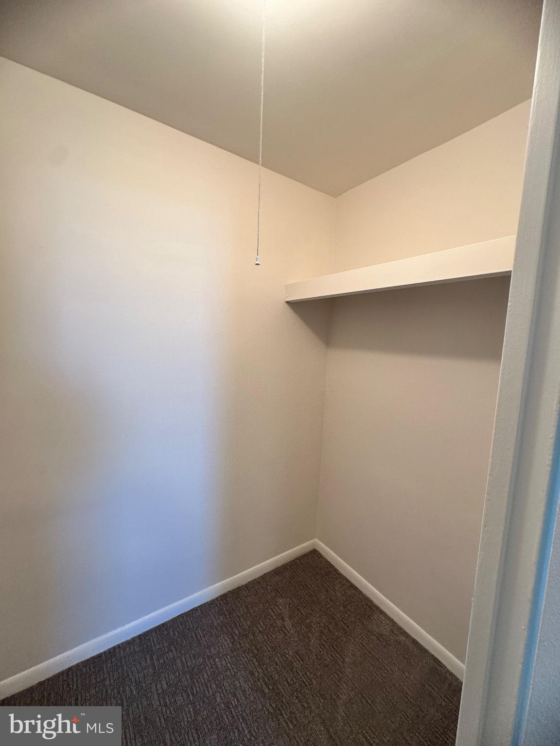 4600 Duke Street, Unit 701 Alexandria, VA 22304 - Photo 17 of 36 Spacious closet with clean lines.