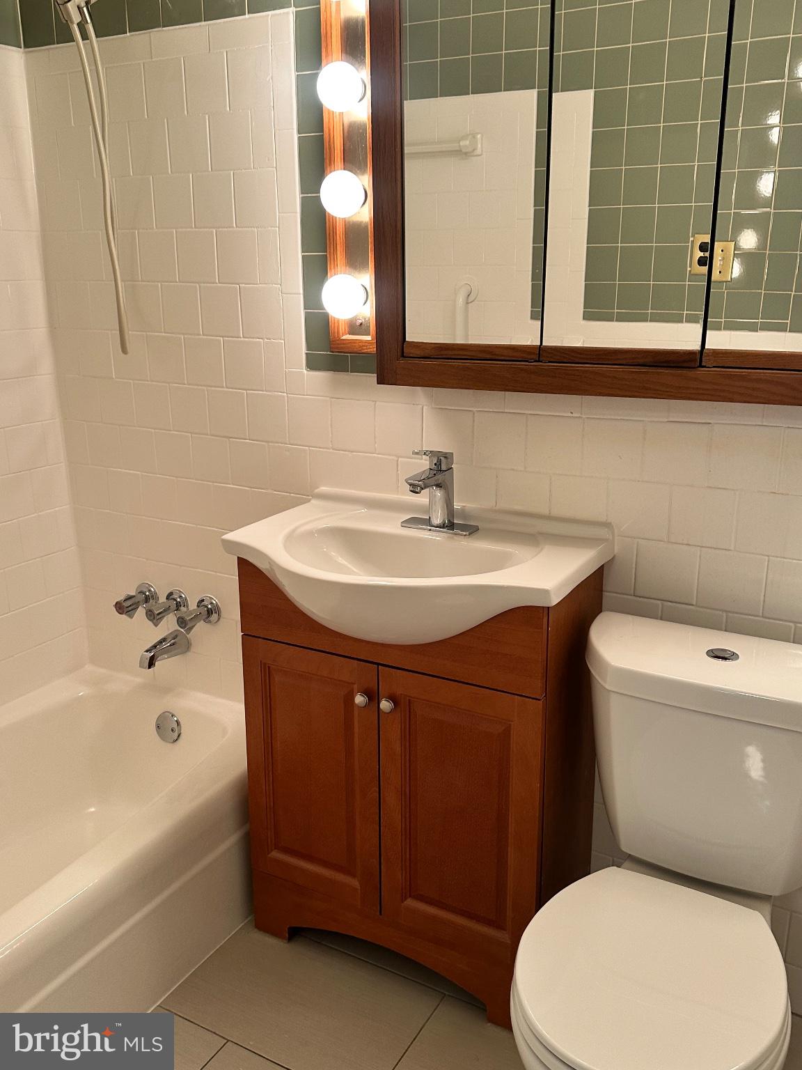 4600 Duke Street, Unit 701 Alexandria, VA 22304 - Photo 19 of 36 Charming bathroom with modern touches.