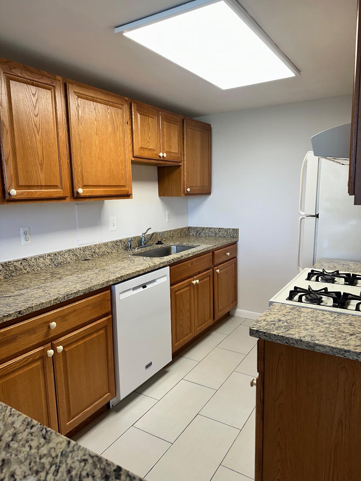 4600 Duke Street, Unit 701 Alexandria, VA 22304 - Photo 2 of 36 Modern kitchen with granite countertops