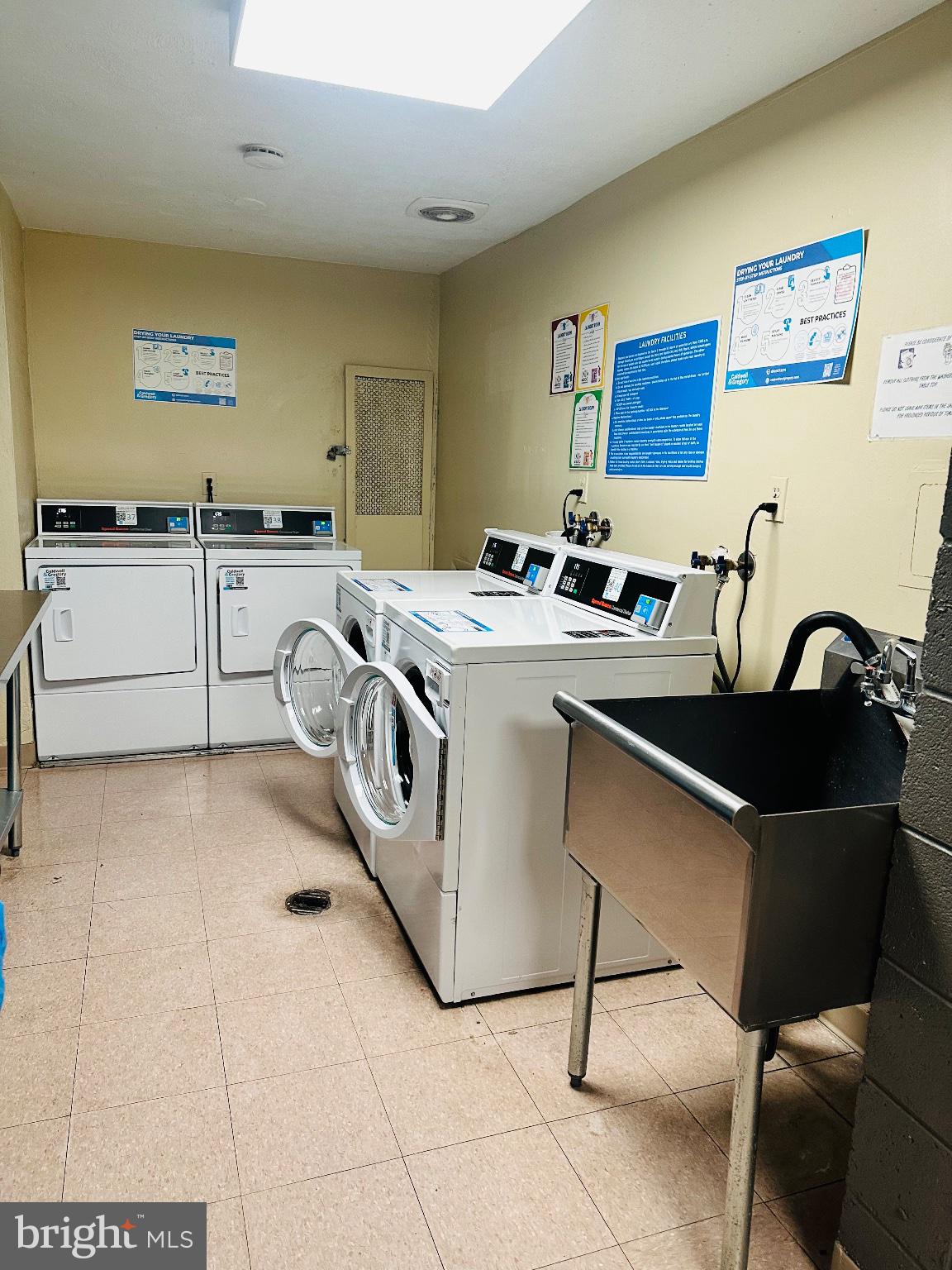 4600 Duke Street, Unit 701 Alexandria, VA 22304 - Photo 25 of 36 Bright and functional laundry space.