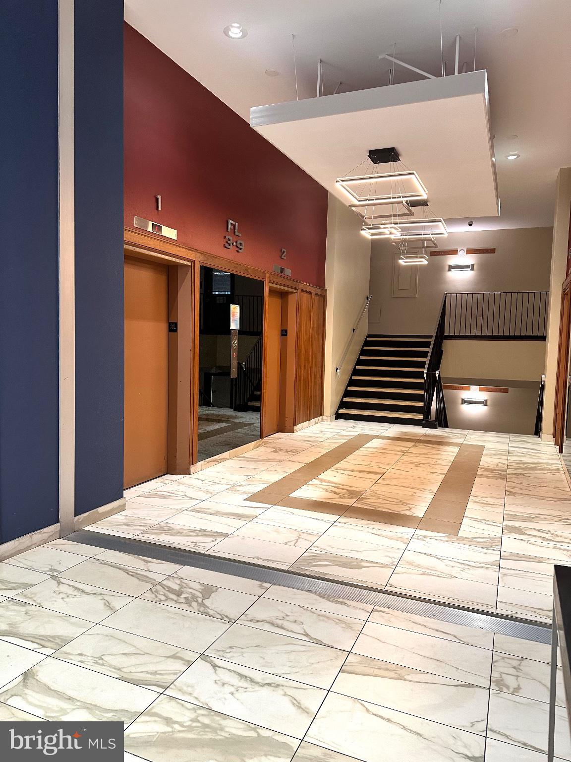 4600 Duke Street, Unit 701 Alexandria, VA 22304 - Photo 29 of 36 Modern lobby with stylish accents.