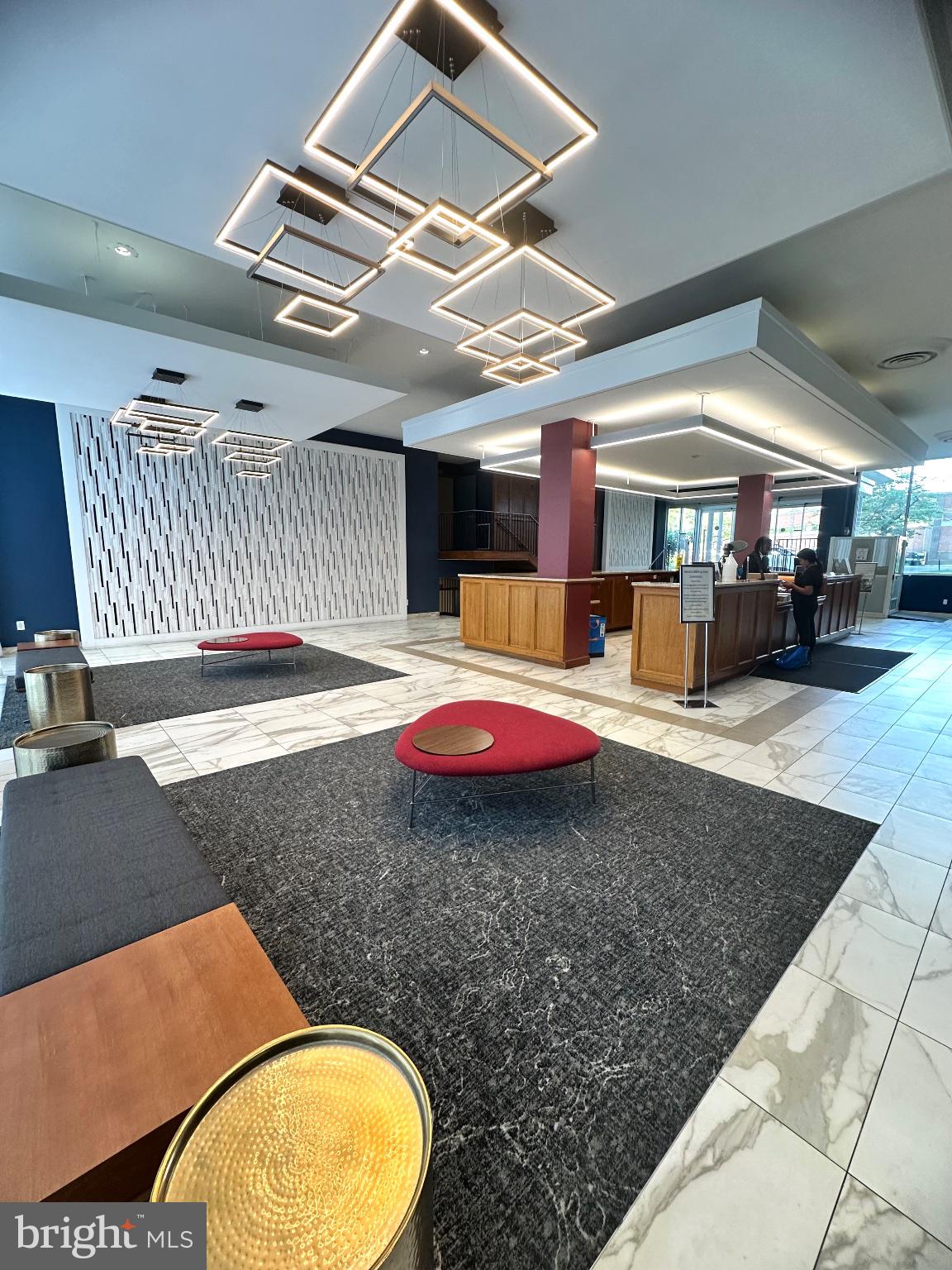 4600 Duke Street, Unit 701 Alexandria, VA 22304 - Photo 31 of 36 Modern lobby with stylish lighting.