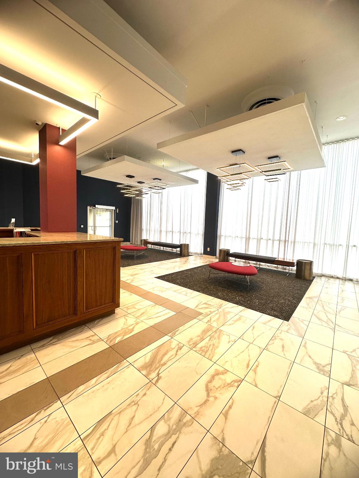 4600 Duke Street, Unit 701 Alexandria, VA 22304 - Photo 32 of 36 Modern lobby with elegant design.