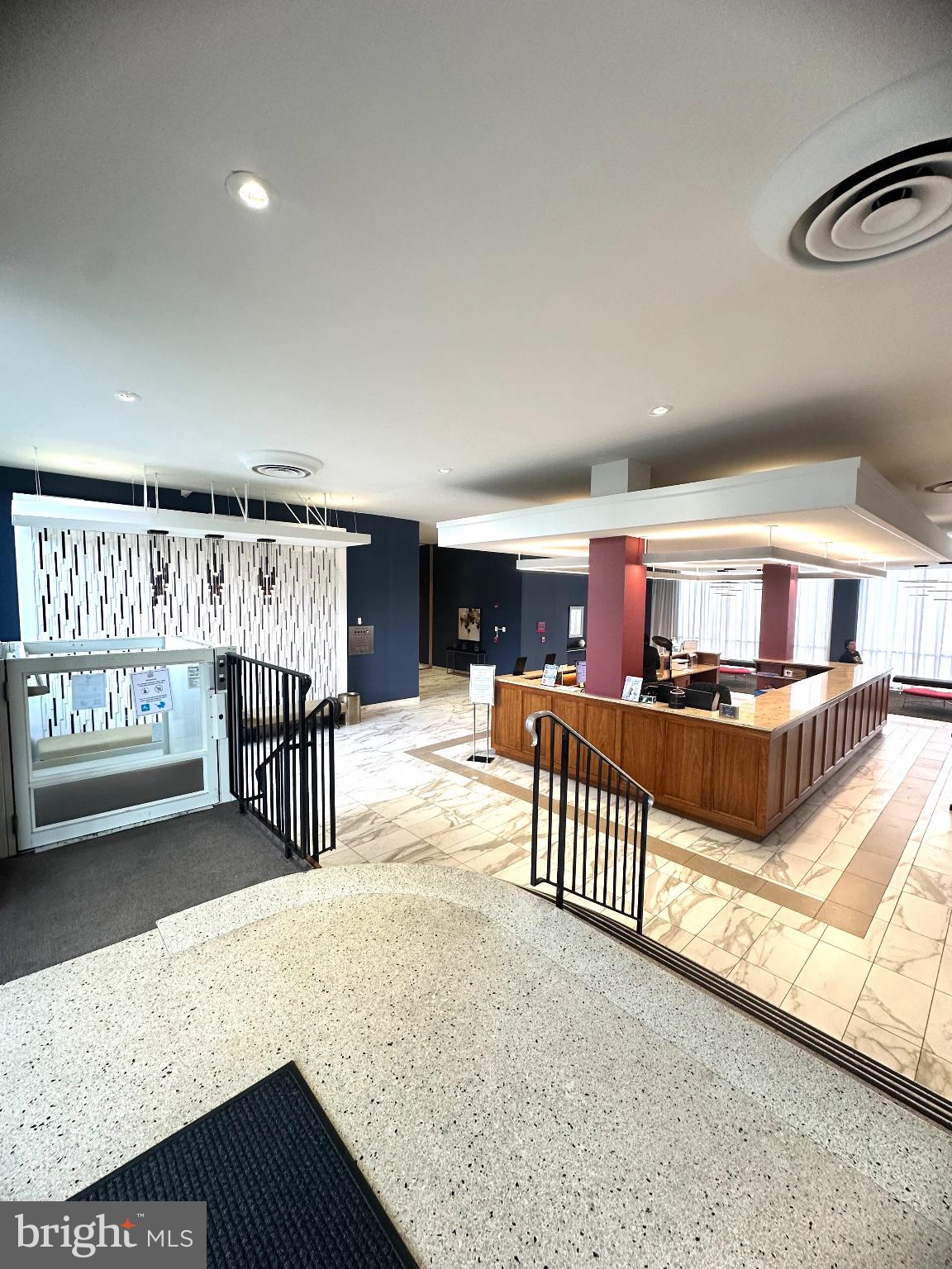 4600 Duke Street, Unit 701 Alexandria, VA 22304 - Photo 34 of 36 Modern lobby with elegant design.