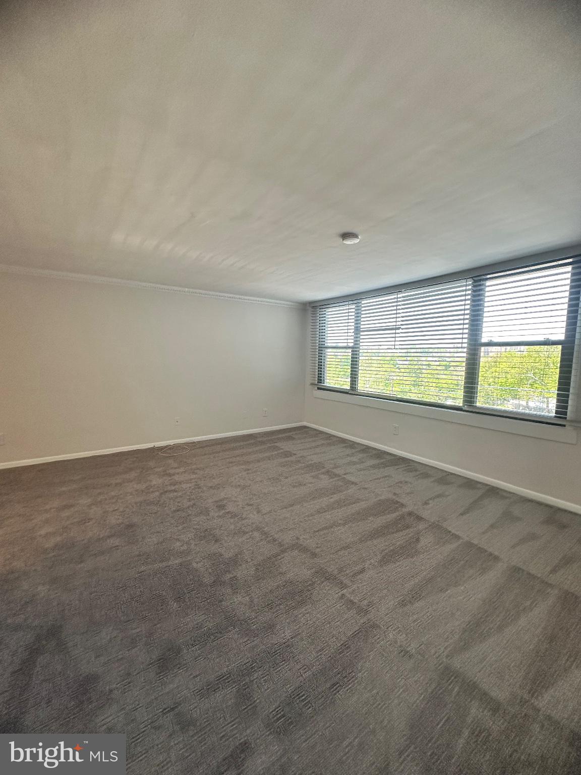 4600 Duke Street, Unit 701 Alexandria, VA 22304 - Photo 8 of 36 Bright and airy open space awaits.