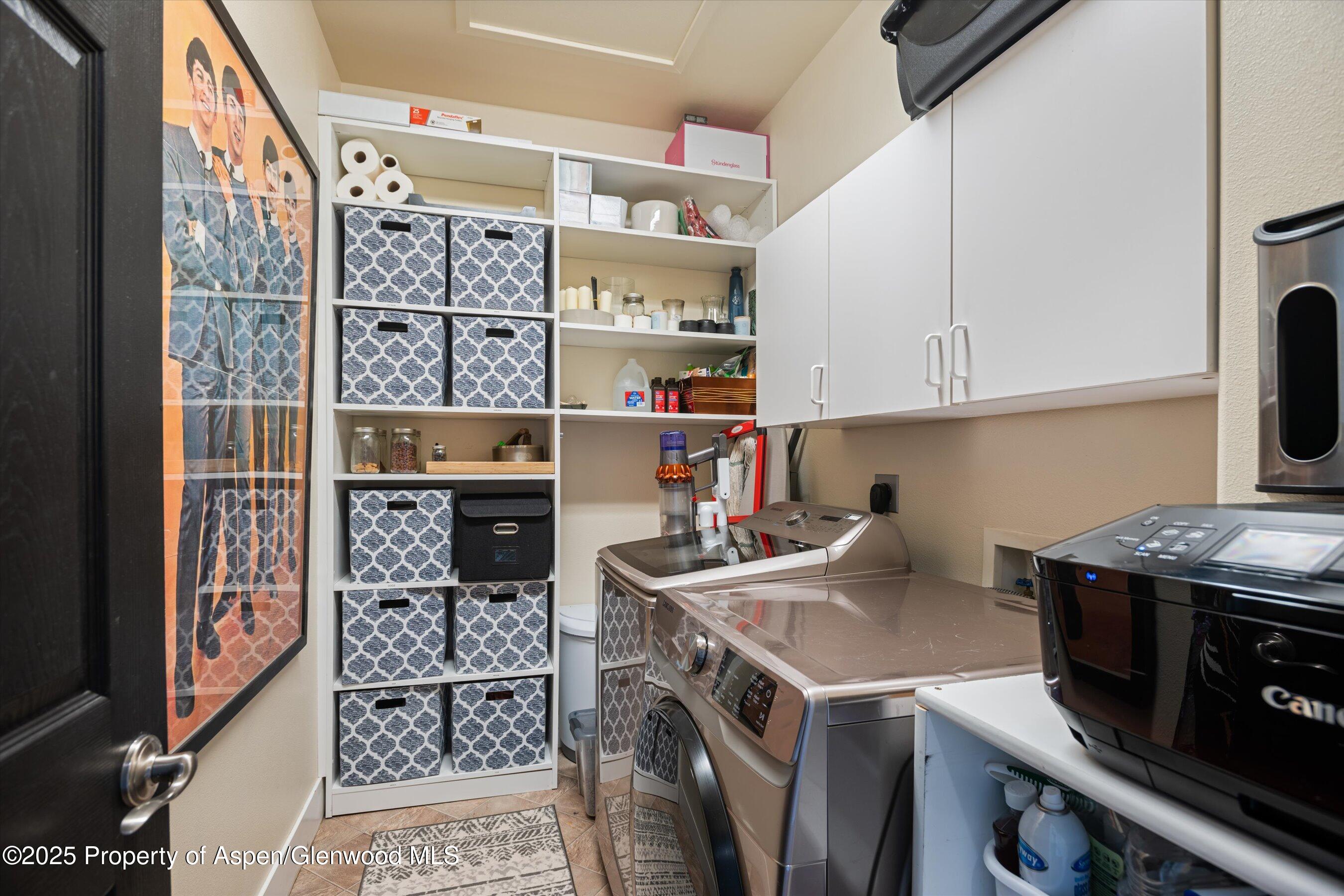 712 Evans Court Basalt, CO 81621 - Photo 14 of 23 a view of kitchen with washer and dryer