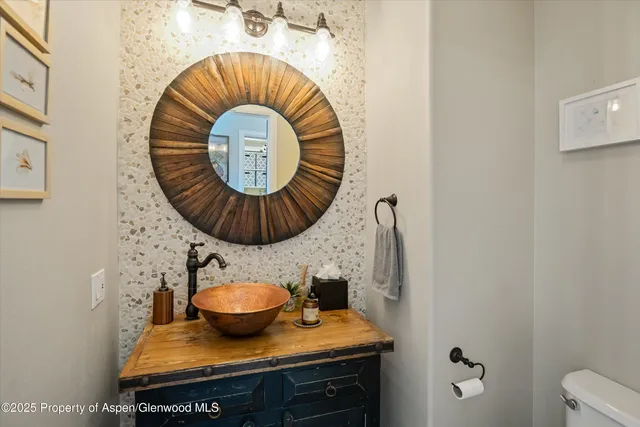 a table with chairs and a stove