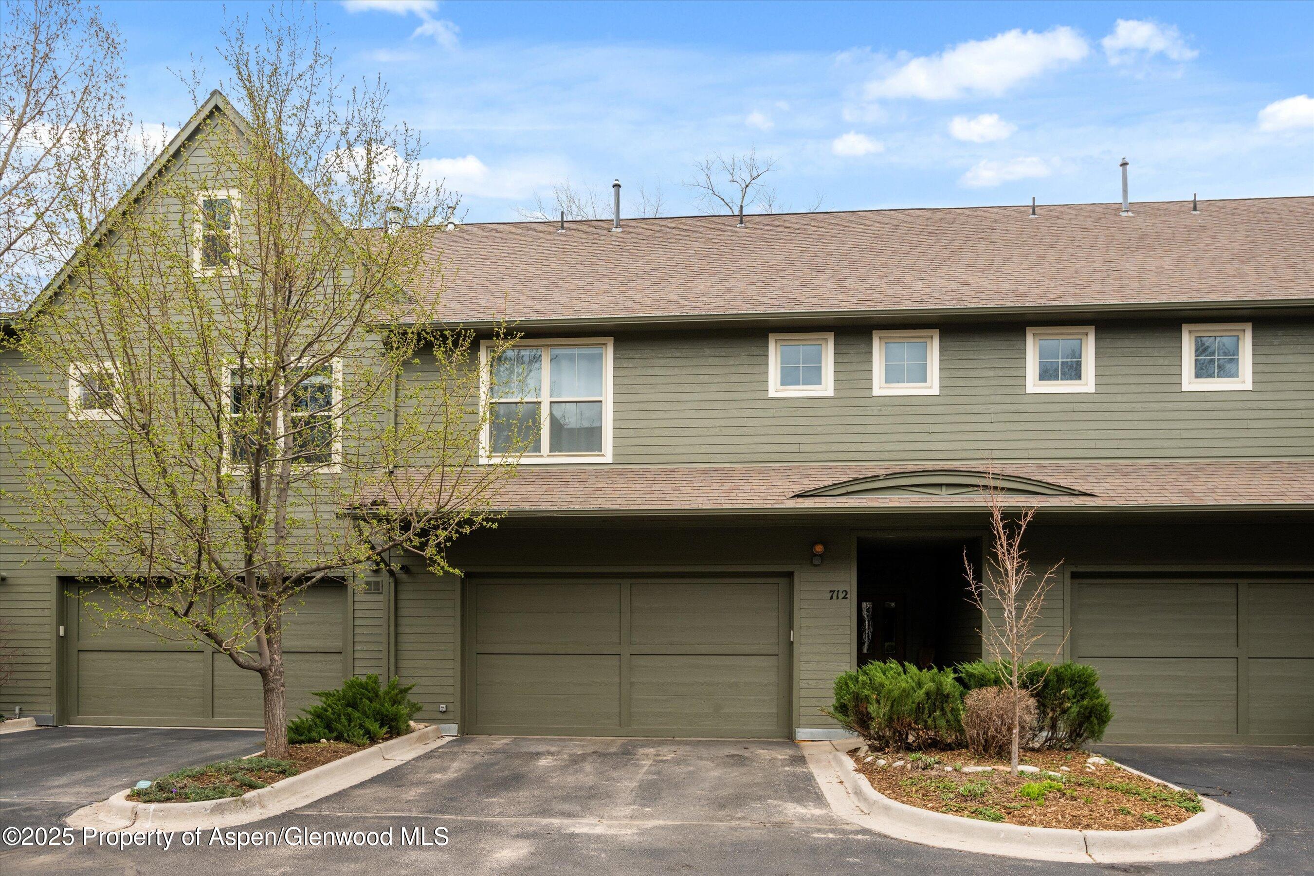 712 Evans Court Basalt, CO 81621 - Photo 22 of 23 a front view of a house with a garden