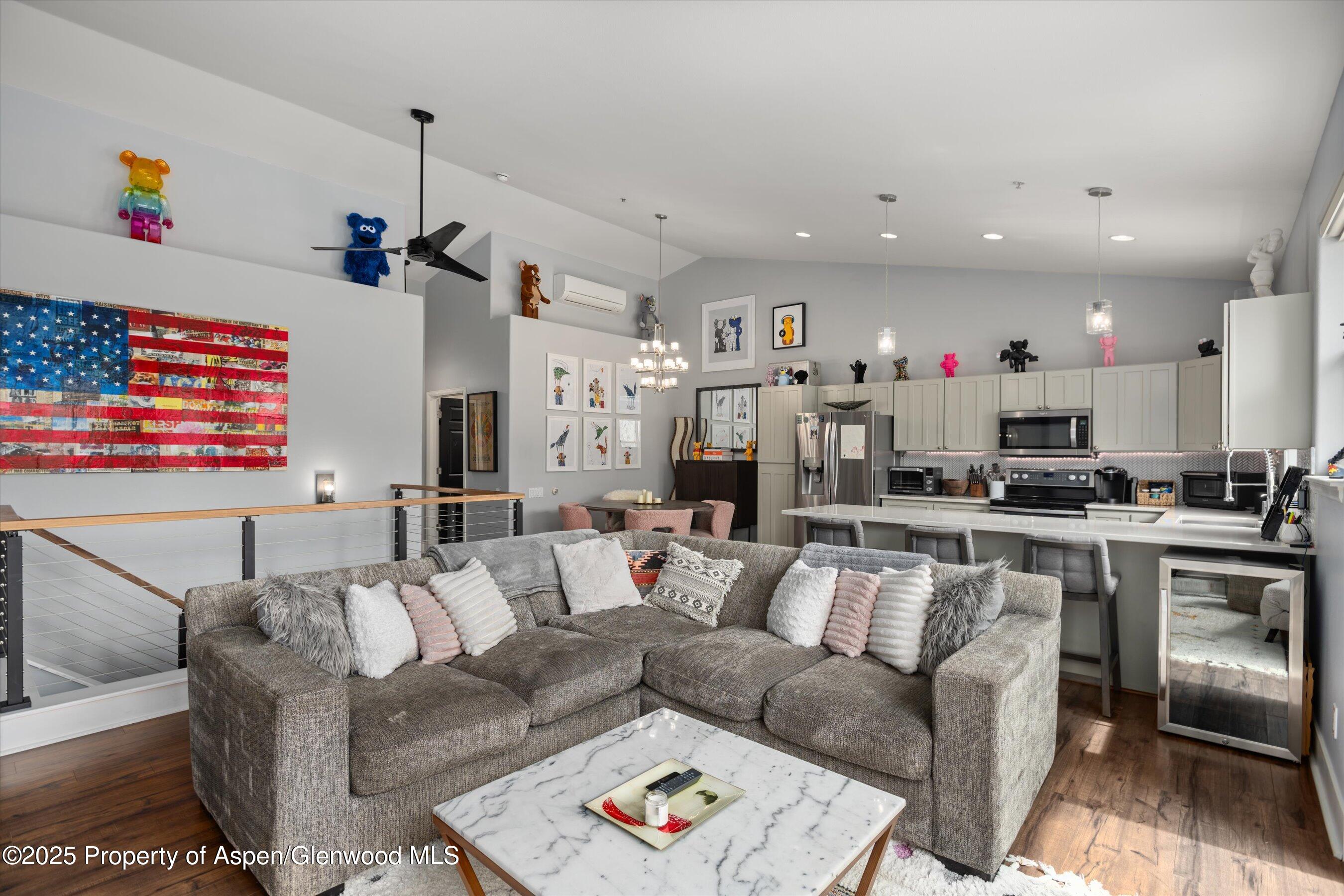 712 Evans Court Basalt, CO 81621 - Photo 3 of 23 a view of a living room kitchen and a window