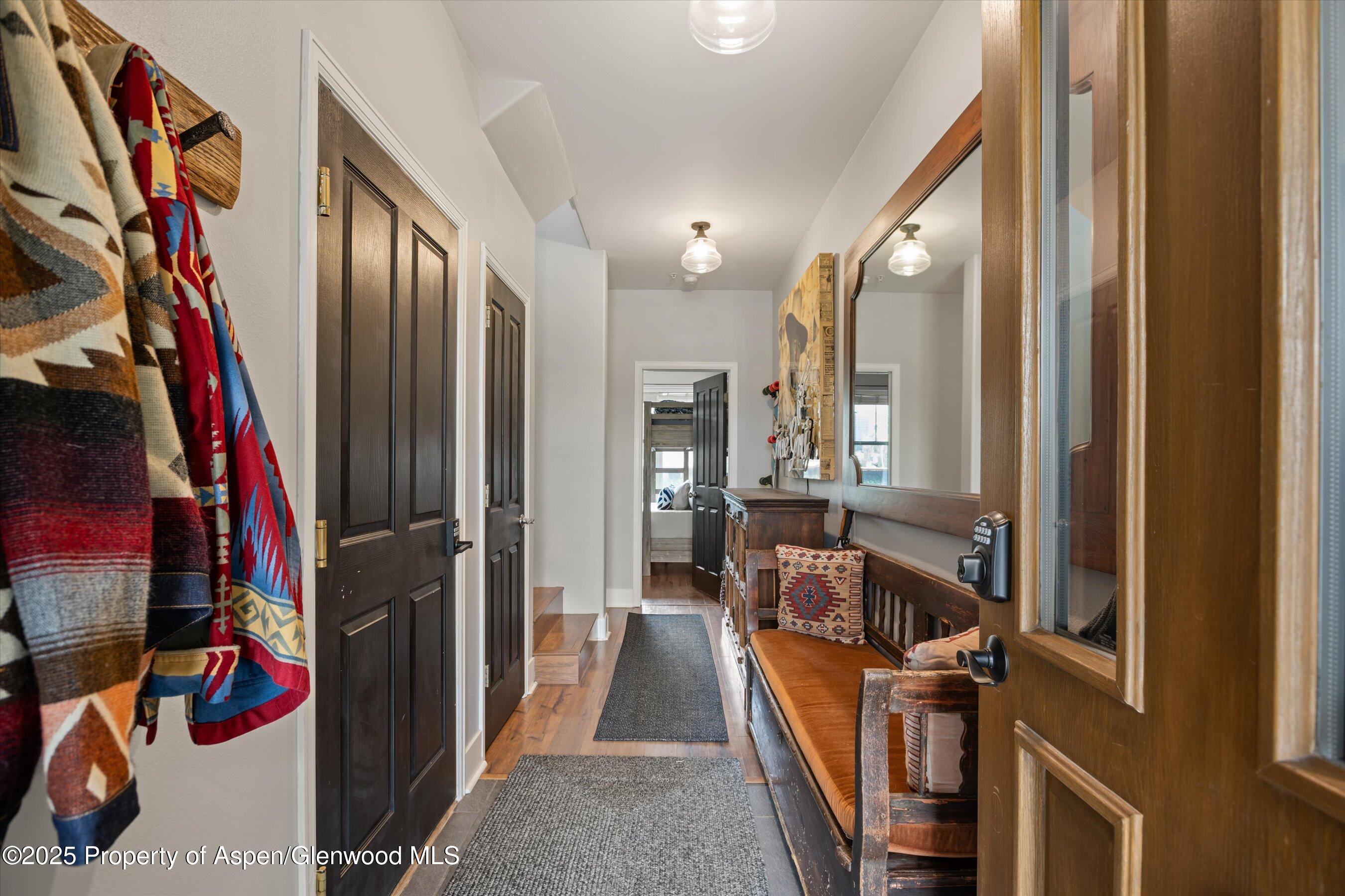 712 Evans Court Basalt, CO 81621 - Photo 5 of 23 a view of walk in closet with clothes and shoes