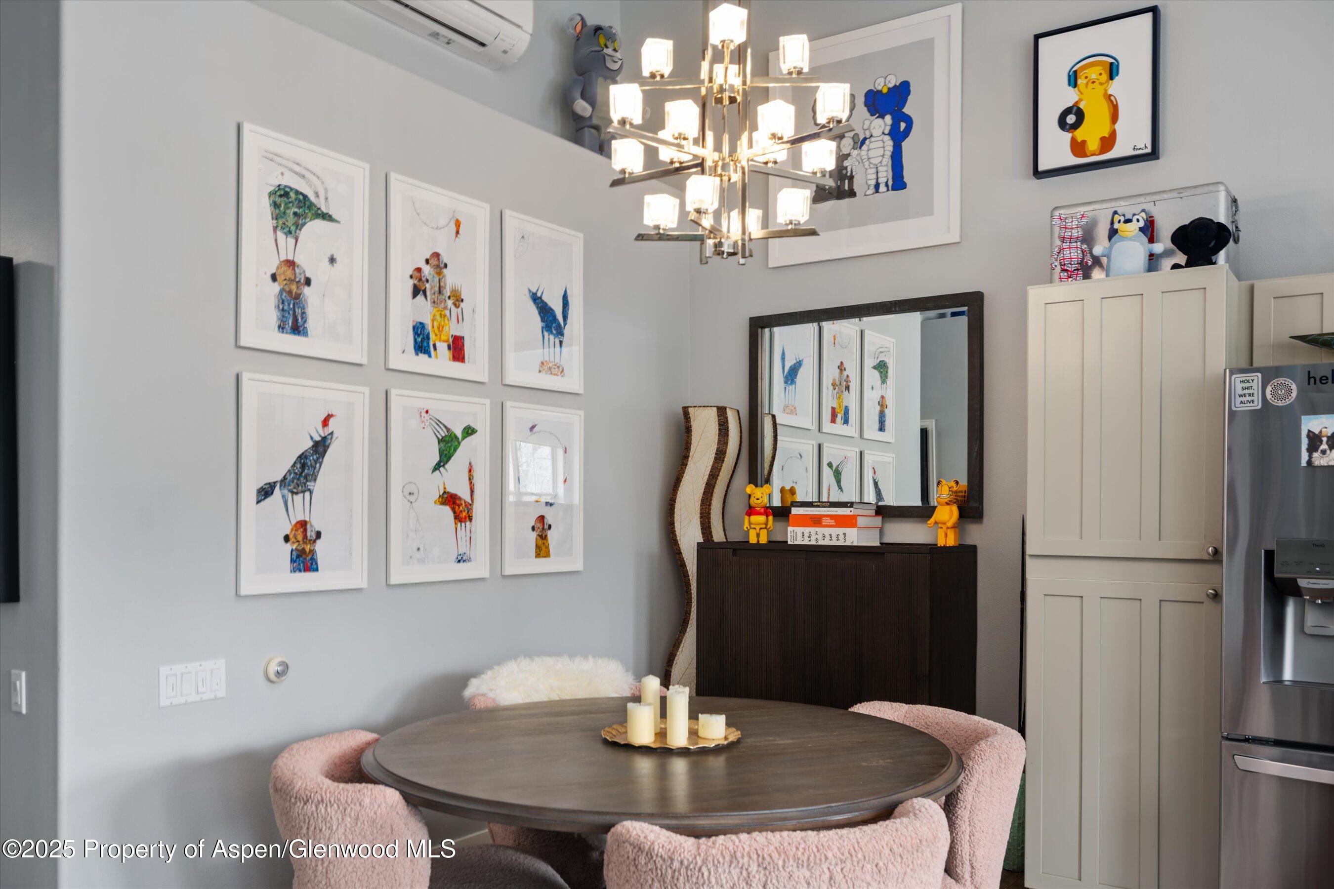 712 Evans Court Basalt, CO 81621 - Photo 6 of 23 a dining room with furniture and chandelier