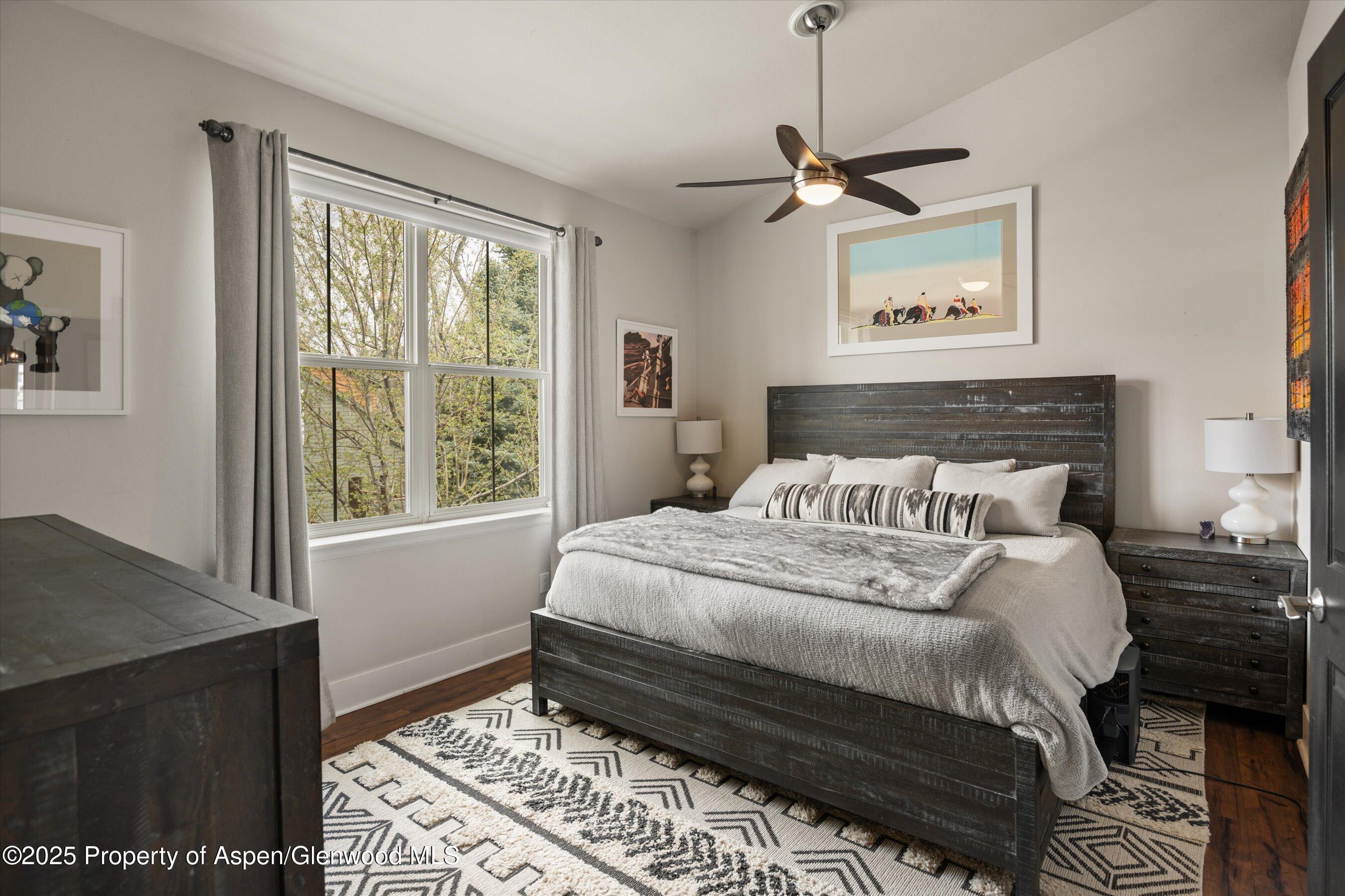 712 Evans Court Basalt, CO 81621 - Photo 9 of 23 a bedroom with a bed and a window