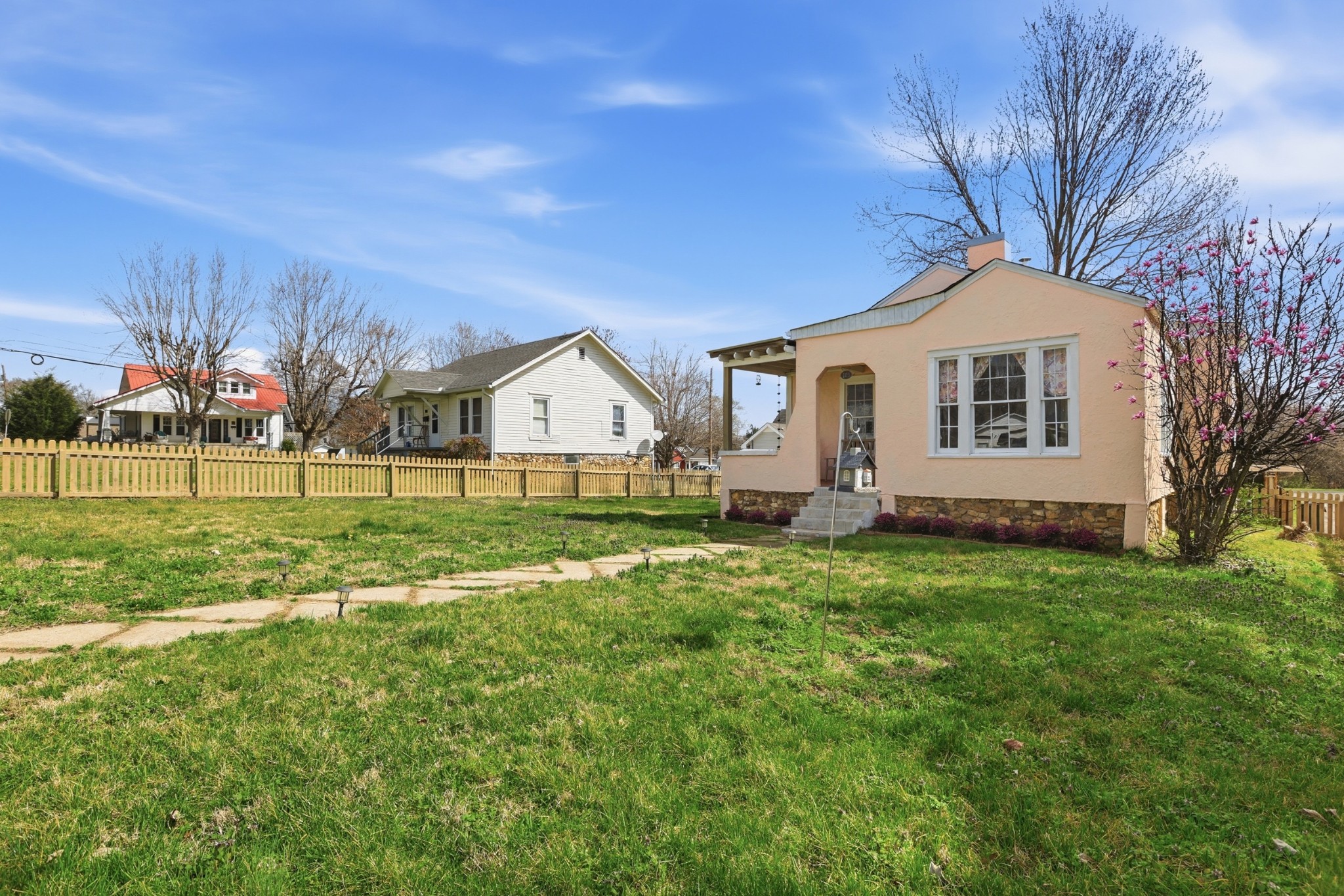 103 Freeman Avenue Dickson, TN 37055 - Photo 15 of 16 a front view of house with yard and green space
