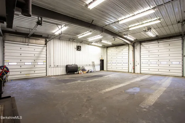 a view of an empty room with windows