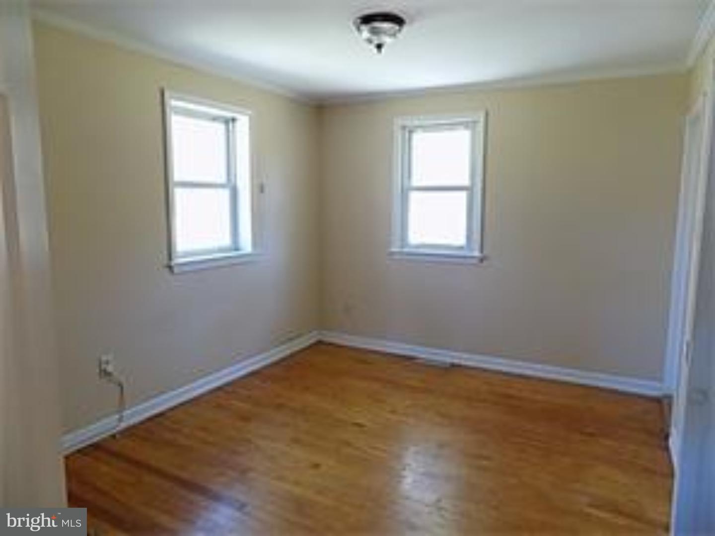 501 Exeter Road Reading, PA 19606 - Photo 6 of 14 an empty room with a window