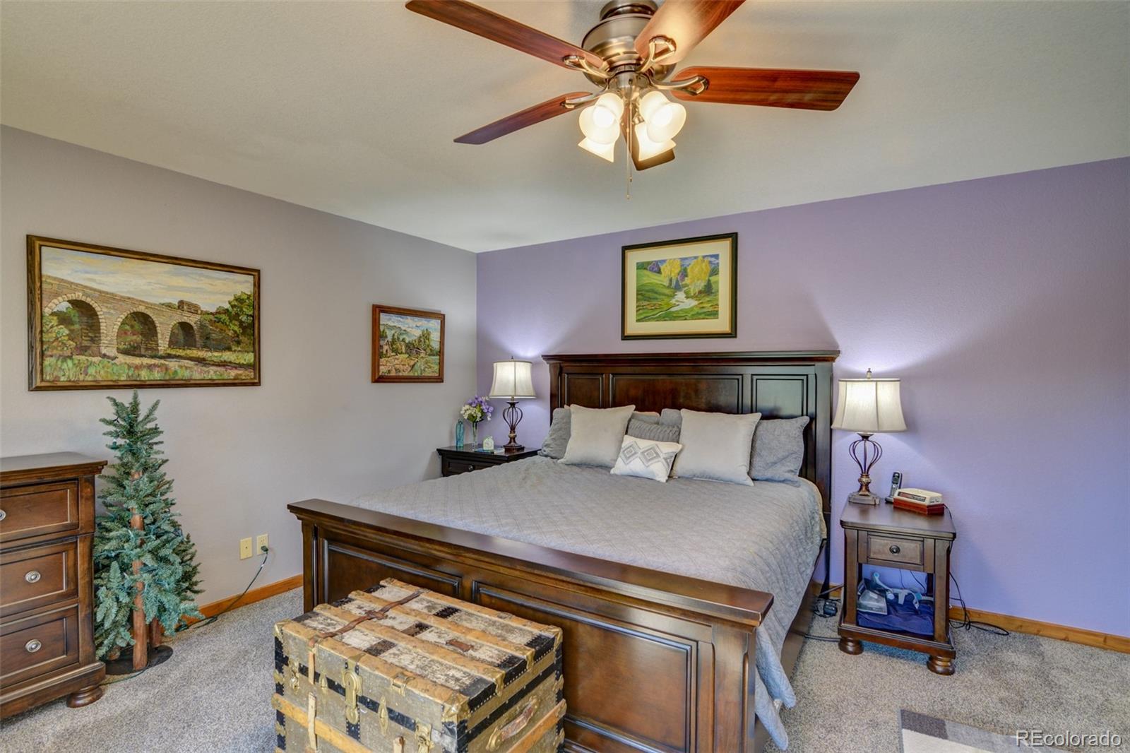 3135 Singletree Road Hartsel, CO 80449 - Photo 20 of 40 a bedroom with a bed and a table in it