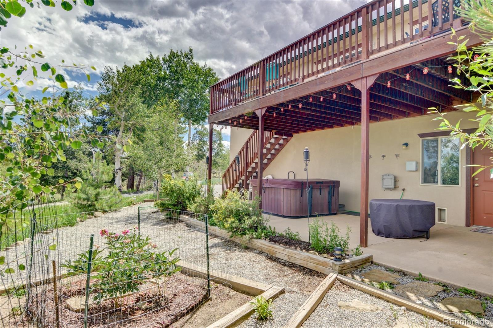 3135 Singletree Road Hartsel, CO 80449 - Photo 31 of 40 a view of a chair and table in the patio