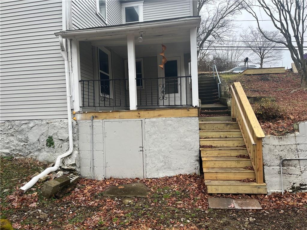 882 Center Road Pittsburgh, PA 15239 - Photo 11 of 13 a view of a house with a door