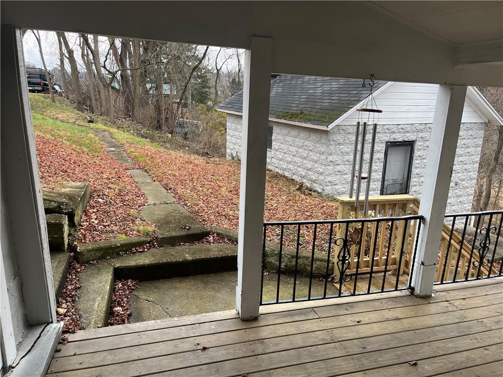 882 Center Road Pittsburgh, PA 15239 - Photo 12 of 13 a view of balcony with wooden floor and door