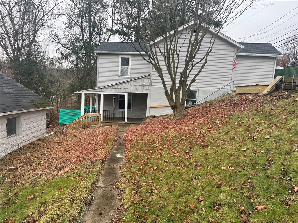 882 Center Road Pittsburgh, PA 15239 - Photo 2 of 13 a view of a house with a yard