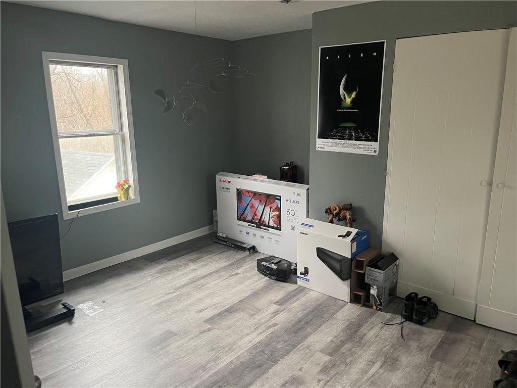 882 Center Road Pittsburgh, PA 15239 - Photo 5 of 13 a room with toys and a window