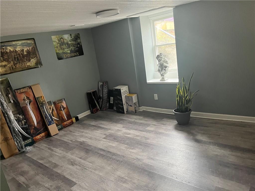 882 Center Road Pittsburgh, PA 15239 - Photo 8 of 13 a view of a room with gym equipment