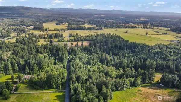 a view of a lake with mountains in the background