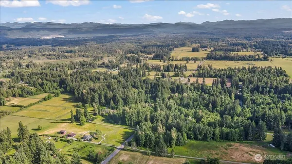 an aerial view of residential house with outdoor space