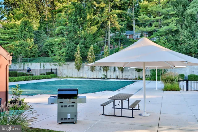 a childrens park with lots of swings and slides