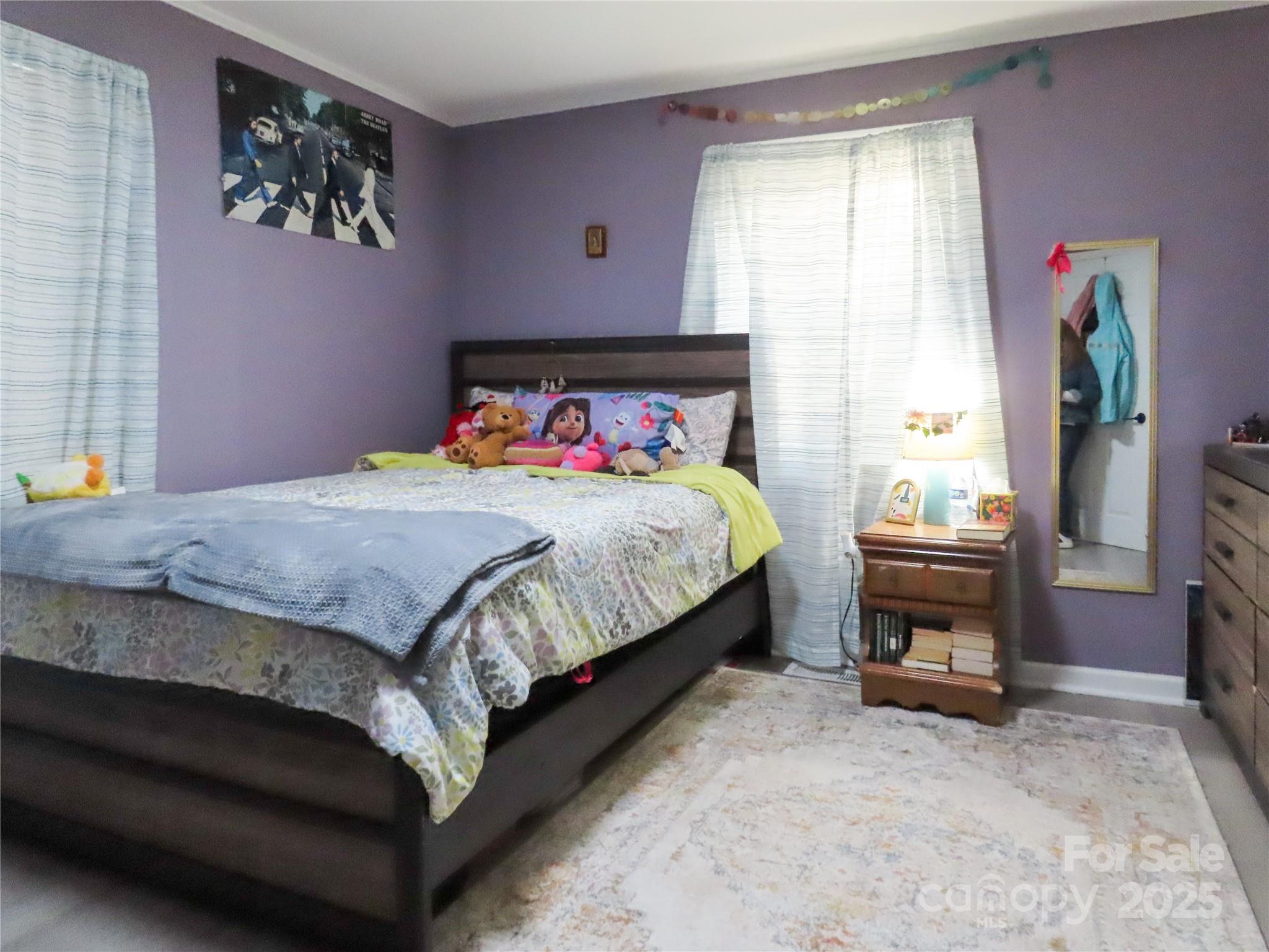 214 West Springs Street Lancaster, SC 29720 - Photo 16 of 33 a bedroom with a bed and a window