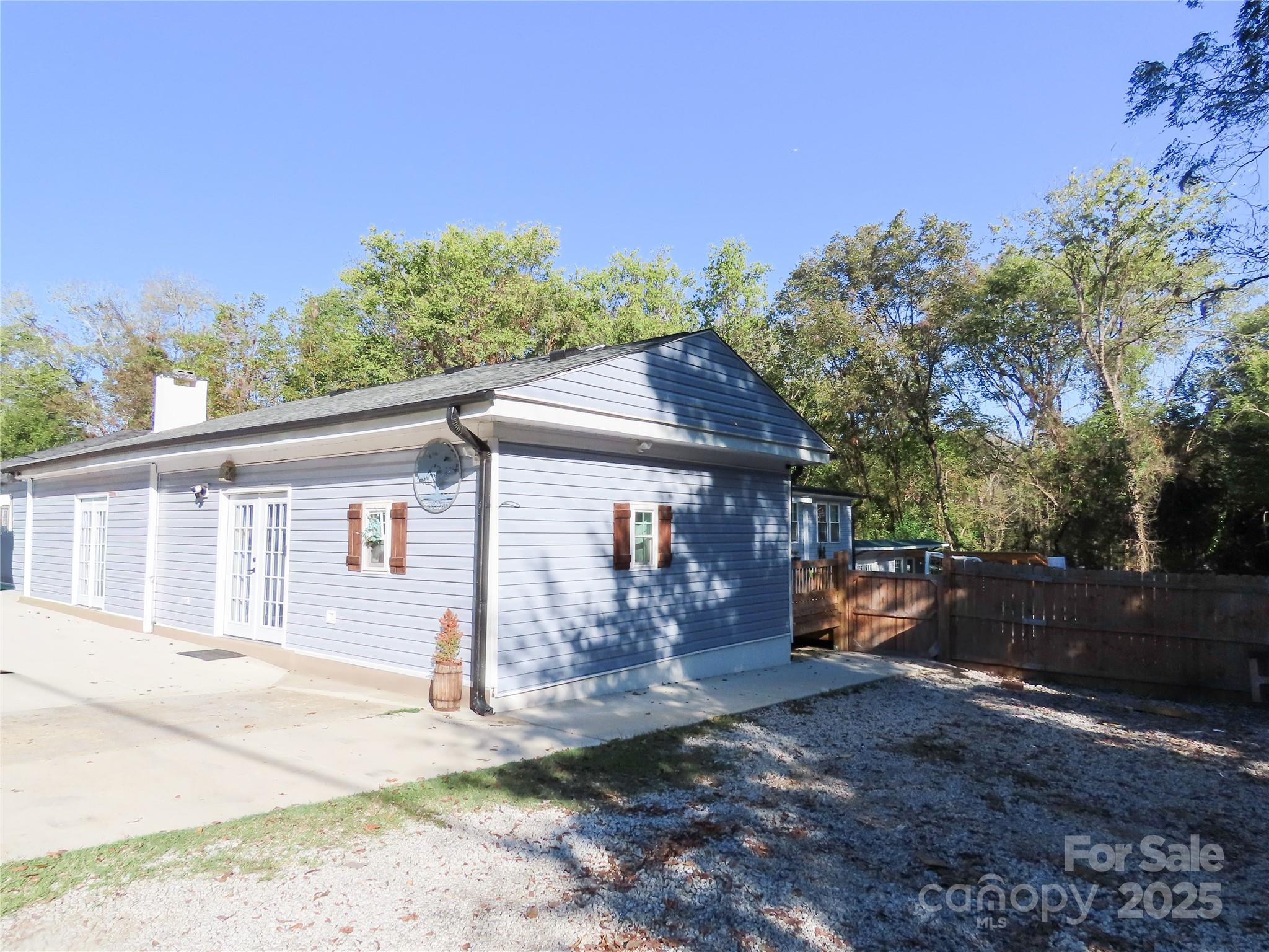 214 West Springs Street Lancaster, SC 29720 - Photo 2 of 33 a view of a house with backyard and a tree