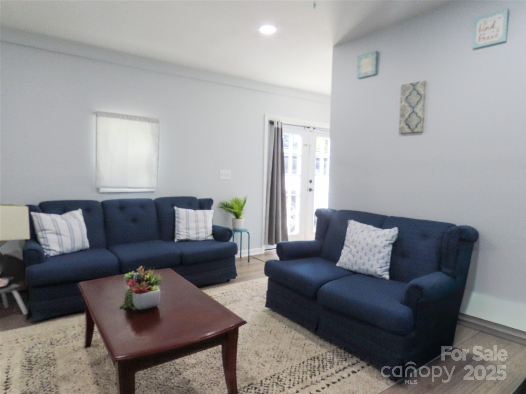 214 West Springs Street Lancaster, SC 29720 - Photo 24 of 33 a living room with furniture and a couch
