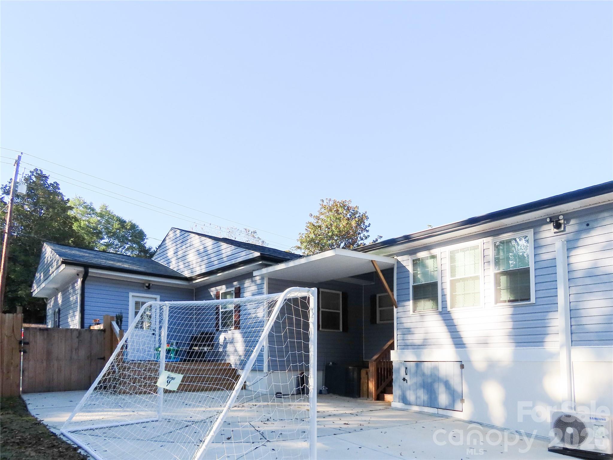 214 West Springs Street Lancaster, SC 29720 - Photo 5 of 33 a front view of a house with parking