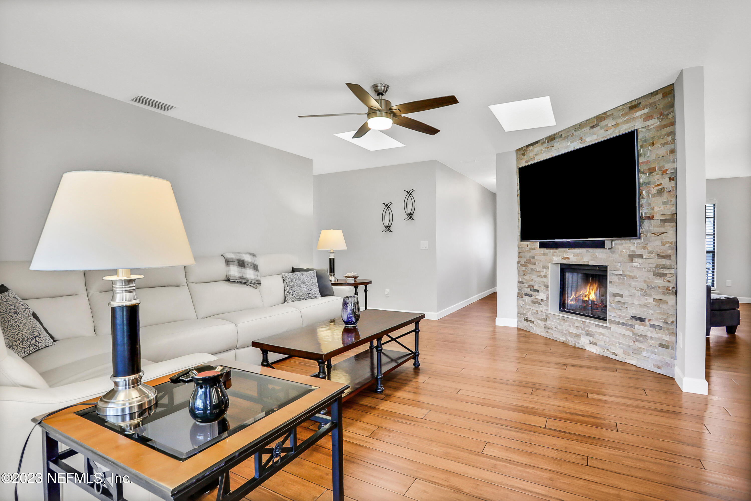 11821 Remsen Road Jacksonville, FL 32223 - Photo 13 of 37 Family room with stone fireplace
