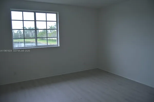 an empty room with a window