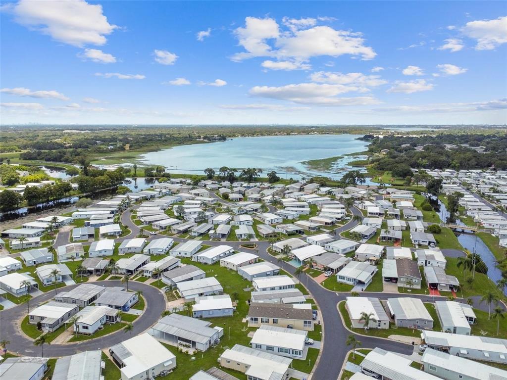 13225 101st Street Southeast, Unit 116 Largo, FL 33773 - Photo 19 of 22 an aerial view of residential houses with outdoor space
